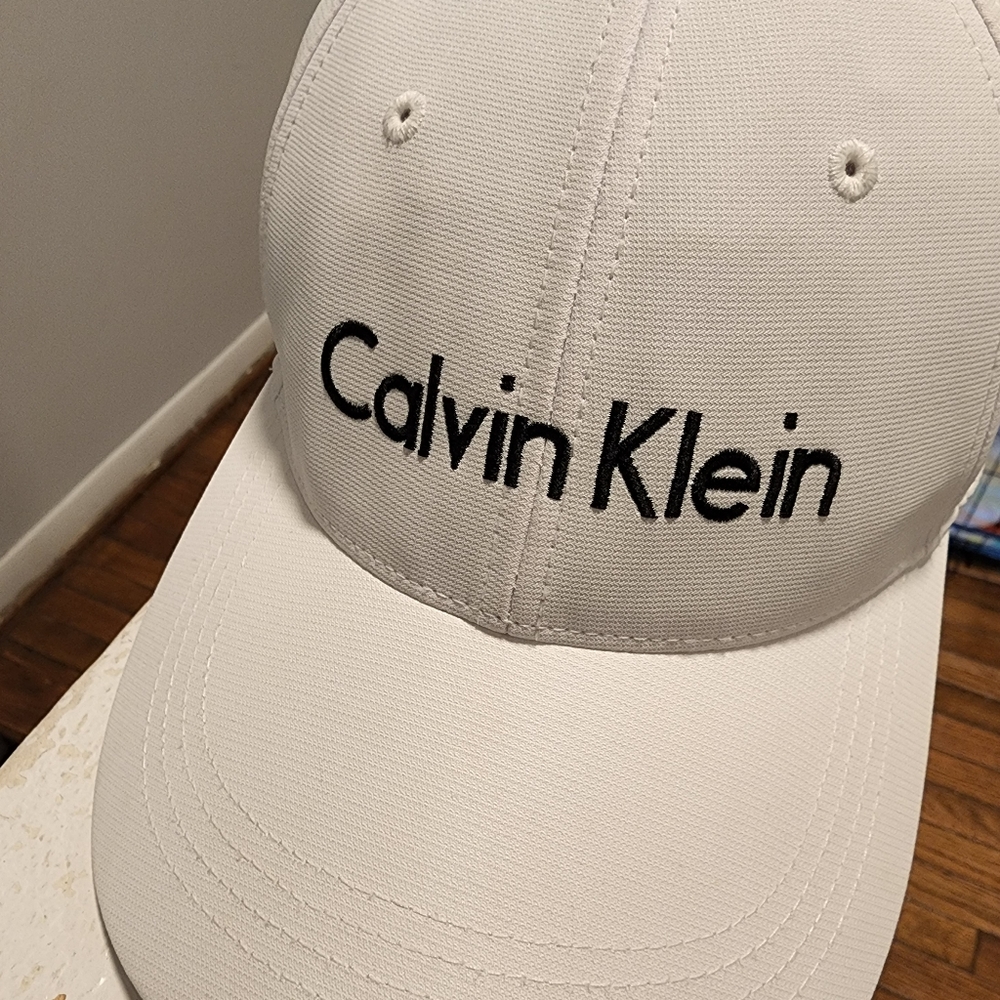 White Calvin Klein Hat.